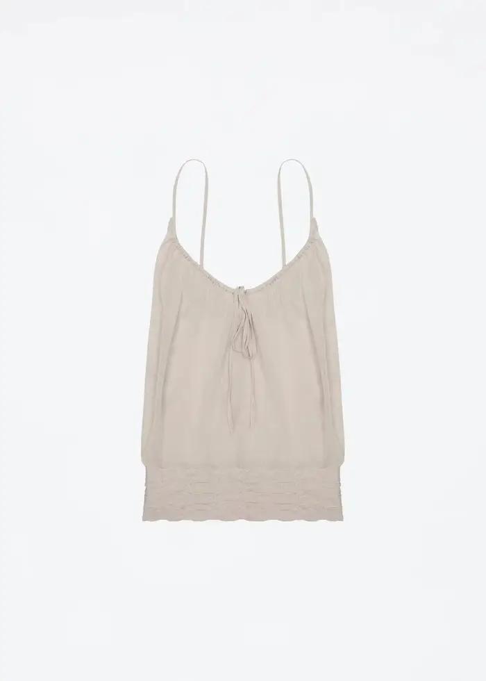 Débardeur beige clair semi-transparent en tricot ultra-fin