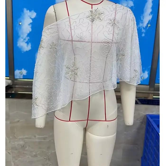 Hauts asymétriques en maille transparente à sequins floraux pour femmes, chemises sexy sans manches 