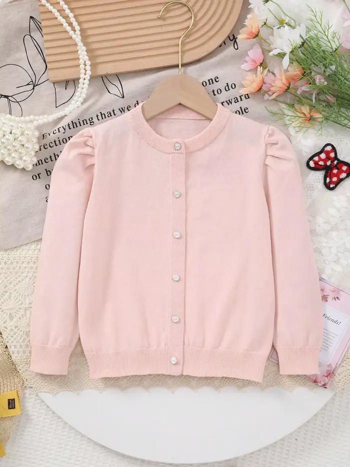 Haut en tricot à col rond pour filles avec de jolies manches bouffantes et un motif de nœud boutonné