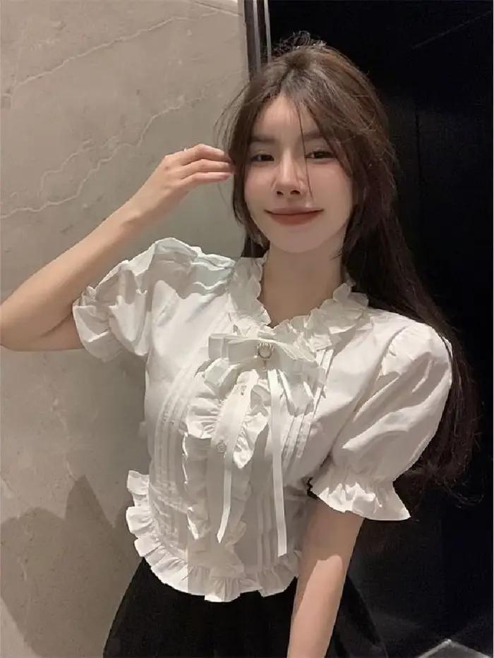 Chemises à manches bouffantes pour femmes, blanches, à volants, élégantes, vintage, pour le bureau, 