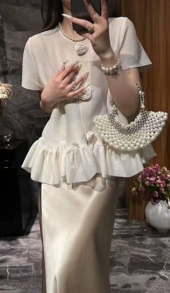 Miyake plissé femmes haut 2025 été nouvelle mode ample grande taille mince à manches courtes japonai