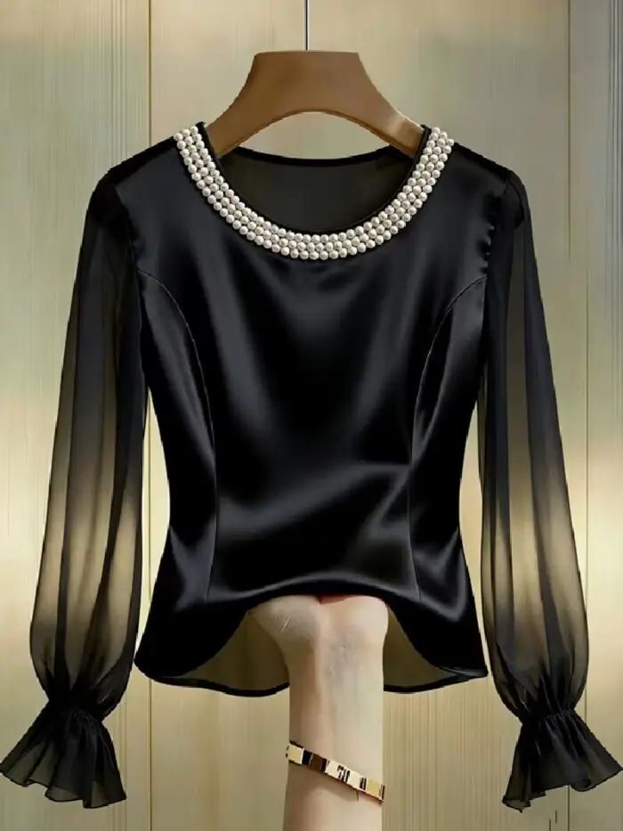 Chemisier élégant à col rond et manches longues en satin et mousseline transparente orné de perles p