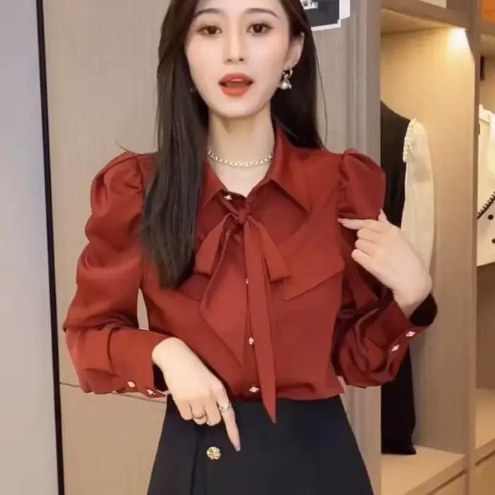 Chemisier élégant à manches bouffantes pour femme avec col polo et nœud décoratif pour occasions printemps automne