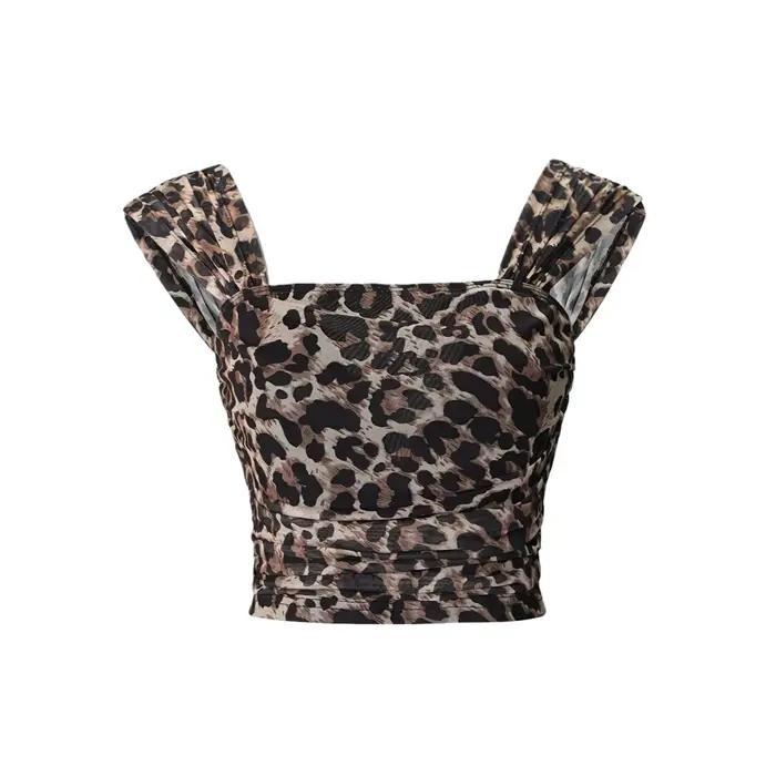 Dame avec haut sexy et élégant dos nu, extensible, à volants imprimé léopard