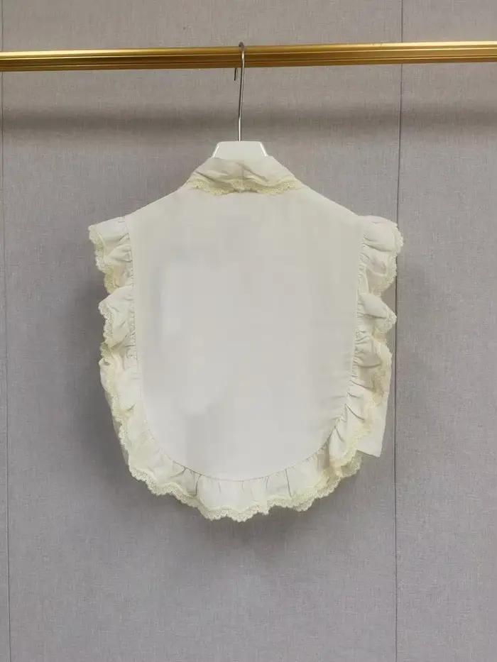 Chemise sans manches pour femme en dentelle à volants
