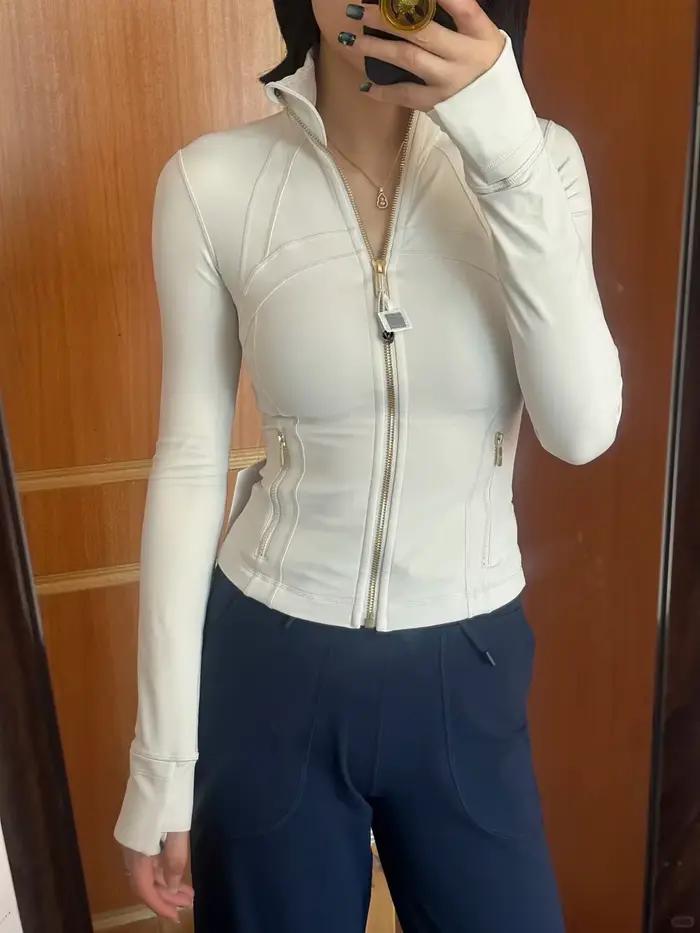 Veste courte à col montant avec fermeture éclair argentée pour femme