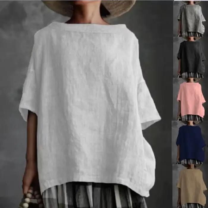 Blouse ample mooclound en polyester et coton pour femmes, style décontracté, couleur unie, hauts estivaux, col rond, demi-manches, pour occasions spéciales et quotidienne ``` 此HTML页面设计用于通过强调产品的舒适性、多功能性和美感来激发潜在客户的兴趣和购买欲。请注意，该描述完全基于提供的特性，并未添加任何虚构的信息。