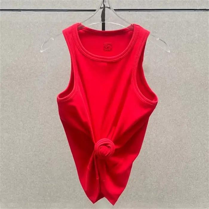Femmes t-shirts nouveau torsadé fleur noué haut sans manches pour l'été 2025 élastique mince pur coton