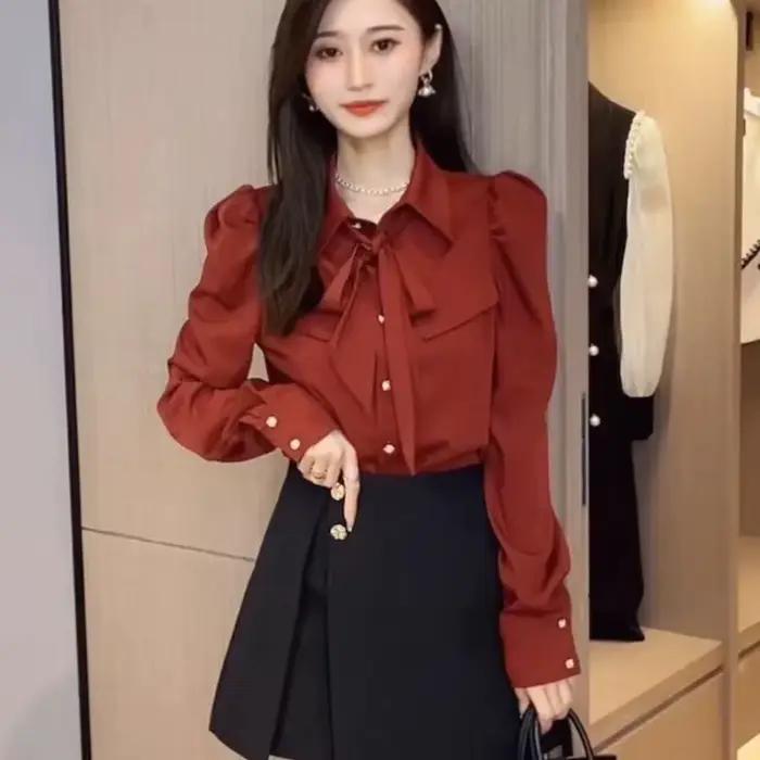 Chemisier élégant à manches bouffantes pour femme avec col polo et nœud décoratif pour occasions printemps automne