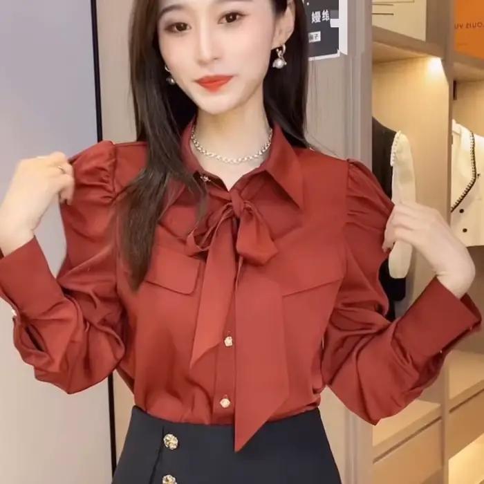 Chemisier élégant à manches bouffantes pour femme avec col polo et nœud décoratif pour occasions printemps automne