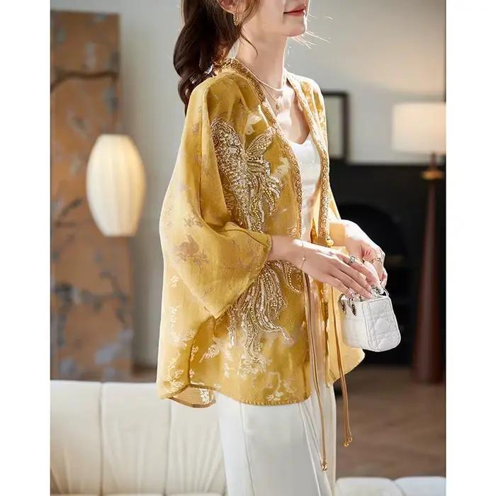 Élégant à lacets évider perles paillettes manches chauve-souris chemises femmes vêtements 2025 été nouveaux hauts amples bureau dame Blouses