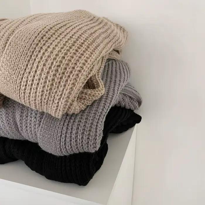 Pull long en tricot pour femme