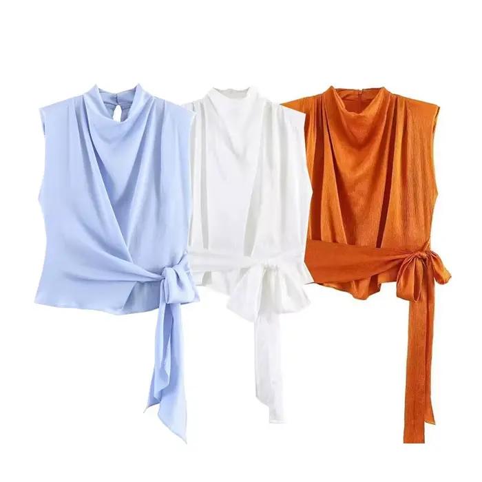 Nouveau haut orné d'un nœud texturé satiné