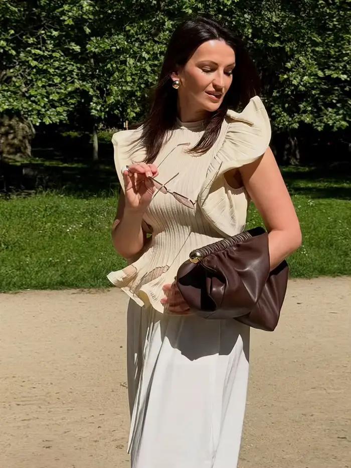 Hauts pour femmes en maille à volants sans manches