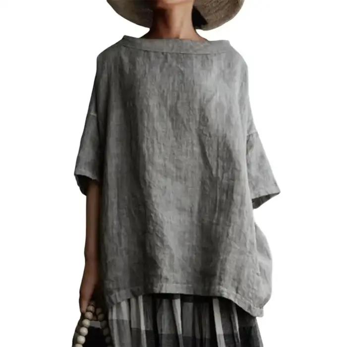 Blouse ample mooclound en polyester et coton pour femmes, style décontracté, couleur unie, hauts estivaux, col rond, demi-manches, pour occasions spéciales et quotidienne ``` 此HTML页面设计用于通过强调产品的舒适性、多功能性和美感来激发潜在客户的兴趣和购买欲。请注意，该描述完全基于提供的特性，并未添加任何虚构的信息。