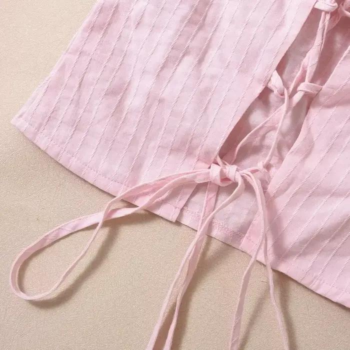 Haut chic rose plissé sans manches