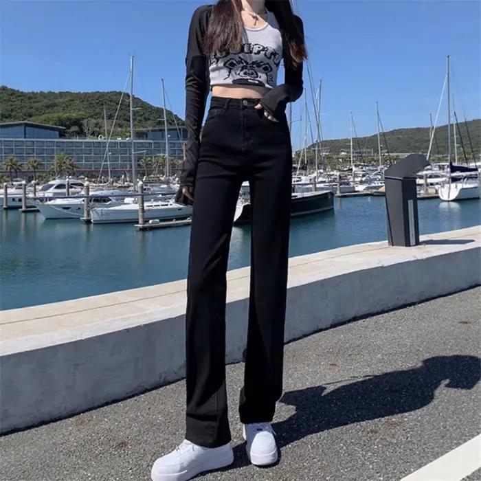 Jean noir taille haute à jambe droite pour femme