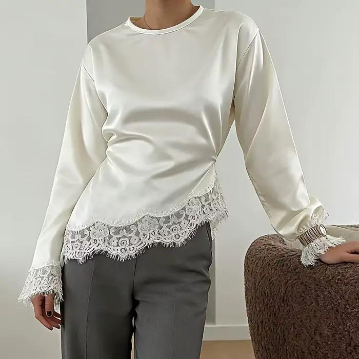 Haut asymétrique à ceinture avec empiècements en dentelle, couleur unie, manches longues évasées, ou