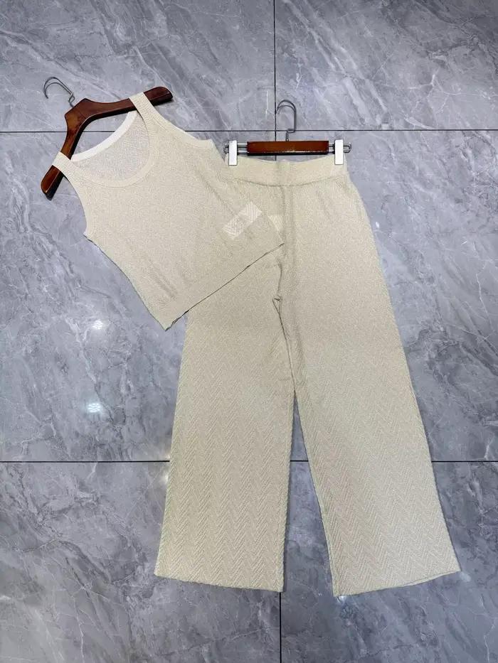 Haut tricoté métallique sans manches à motif chevron pour femme + pantalon à jambes larges à taille