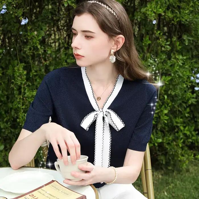 I BELIEVE YOU Haut en tricot bleu marine Été 2026, Hauts en tricot scintillants, Blouse à nœud papil