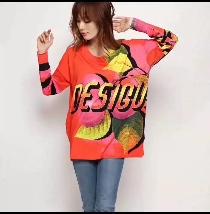 Nouveau pull tricoté asymétrique à col rond imprimé espagnol pour une commande originale d'exportati