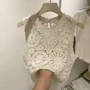 Débardeur décontracté pour femme en dentelle crochetée sans manches, motif floral ajouré, coupe ampl
