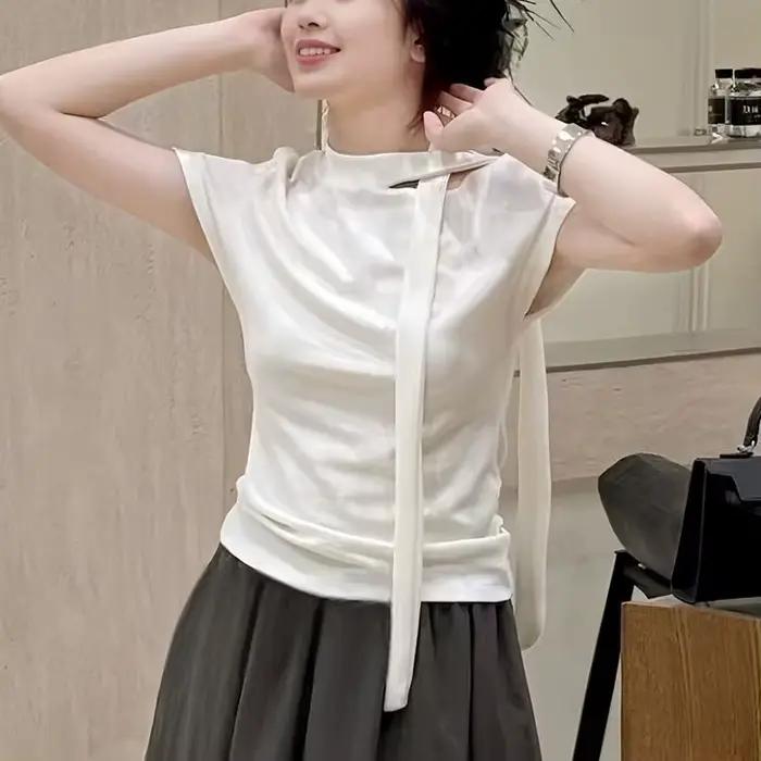 T-shirt blanc à manches courtes pour femmes épaules dénudées haut polyvalent décontracté nouveau design été 2025