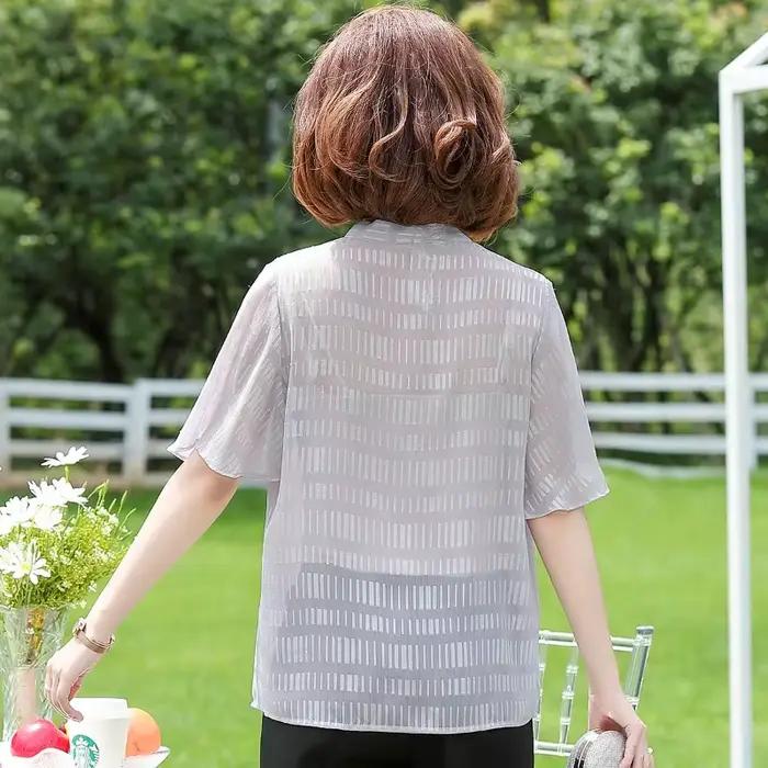 Blouse élégante en mousseline à nœud papillon pour femme d'âge mûr