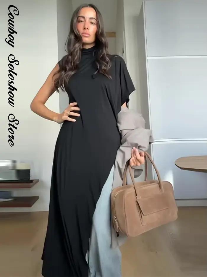 Haut asymétrique noir unique pour femme