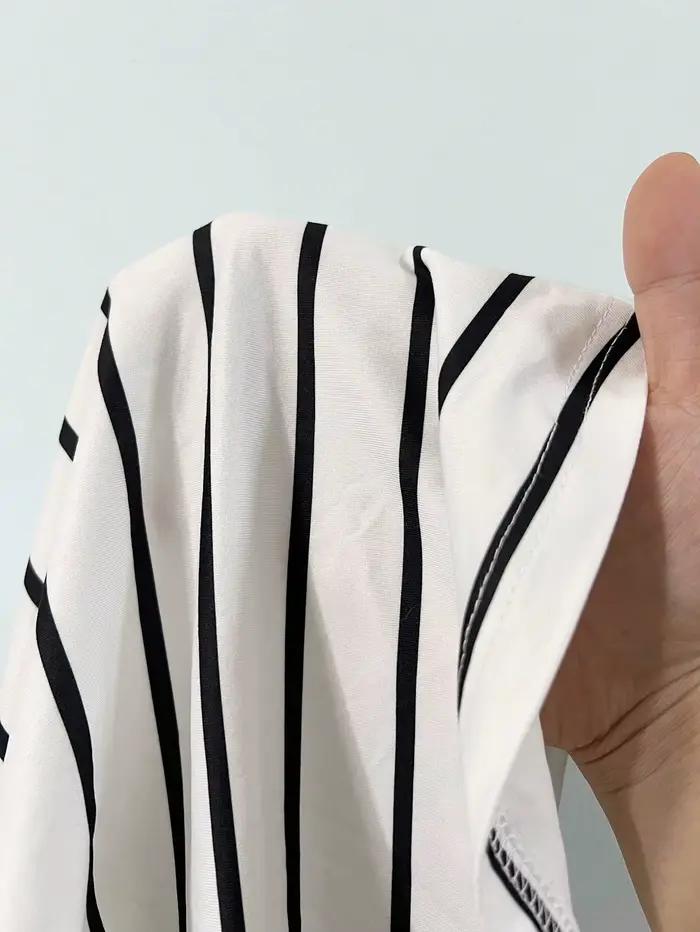 Haut asymétrique à rayures horizontales noires et blanches