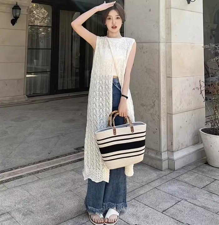 Cardigan long sans manches en crochet style bohème pour femme