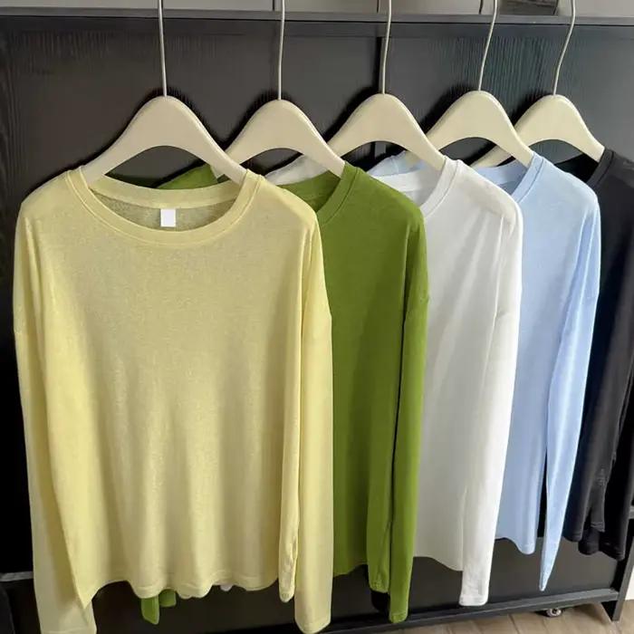 T-shirt à manches longues légèrement transparents pour femmes protection solaire été décontracté polyester ample confortable