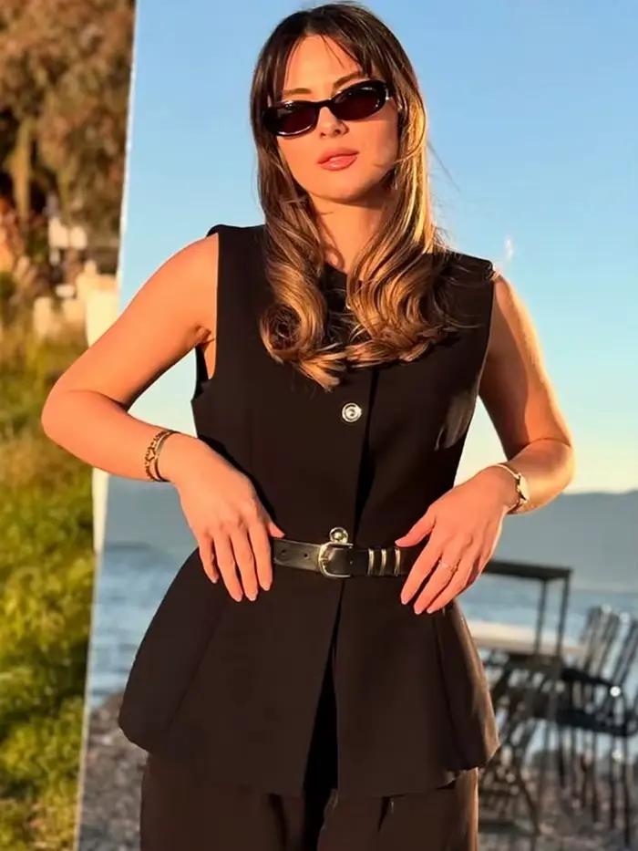 Gilet noir pour femme HH avec ceinture