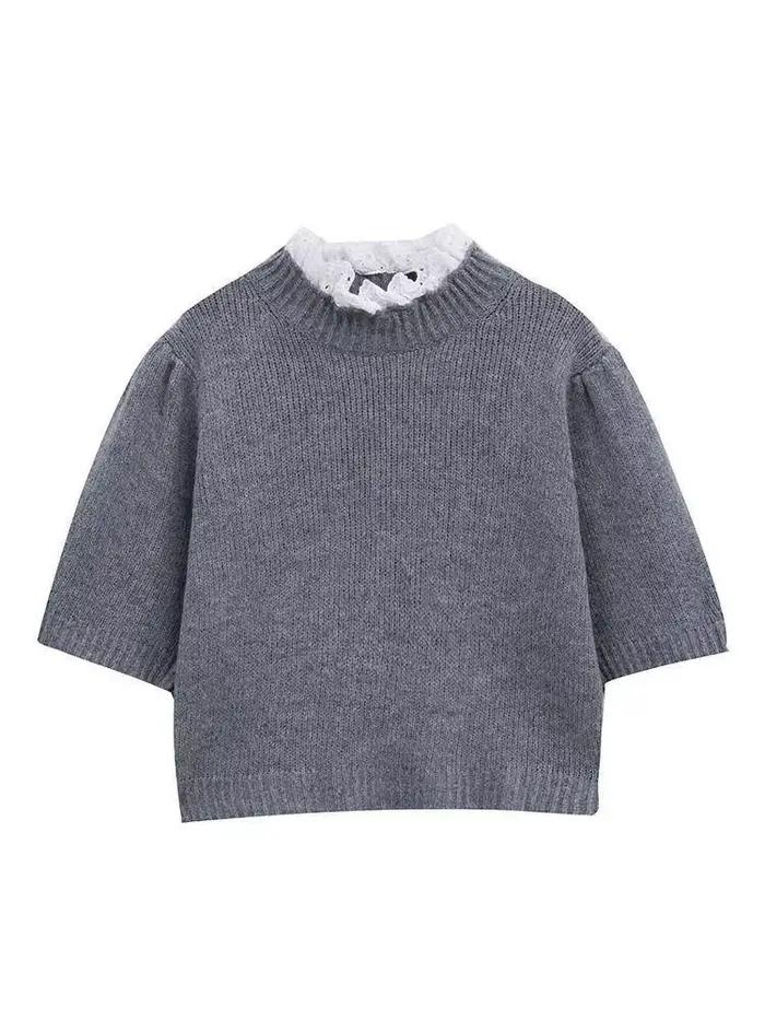 Pull tricoté à demi-col roulé avec manches bouffantes uniques