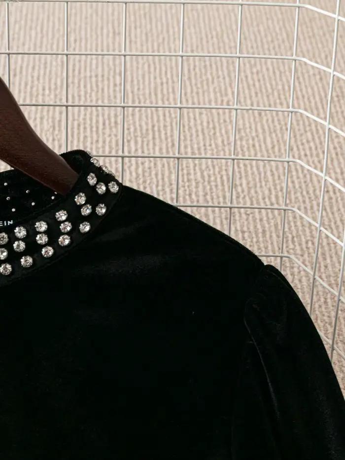 Chemisier en velours noir pour femme