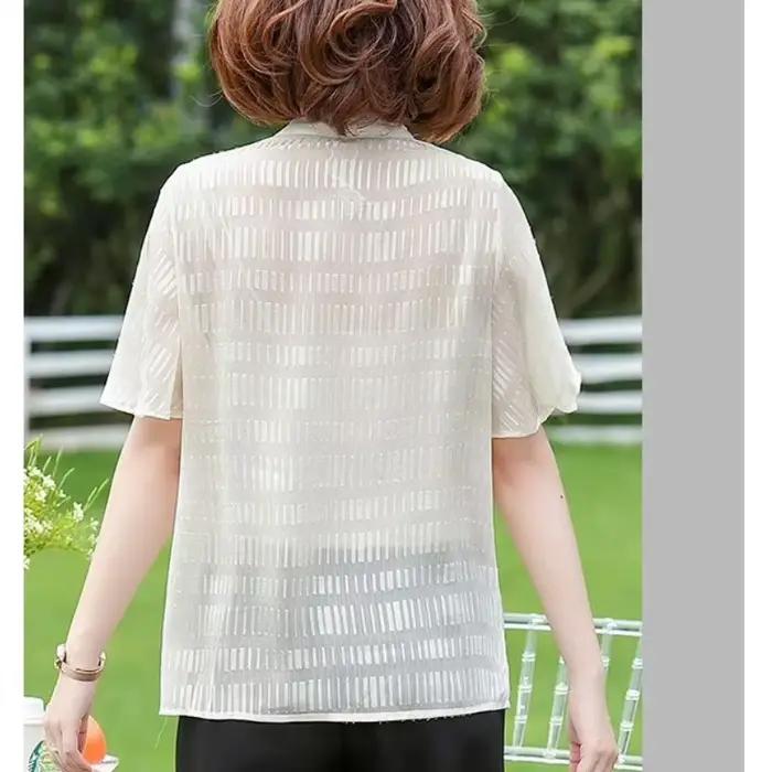 Blouse élégante en mousseline à nœud papillon pour femme d'âge mûr