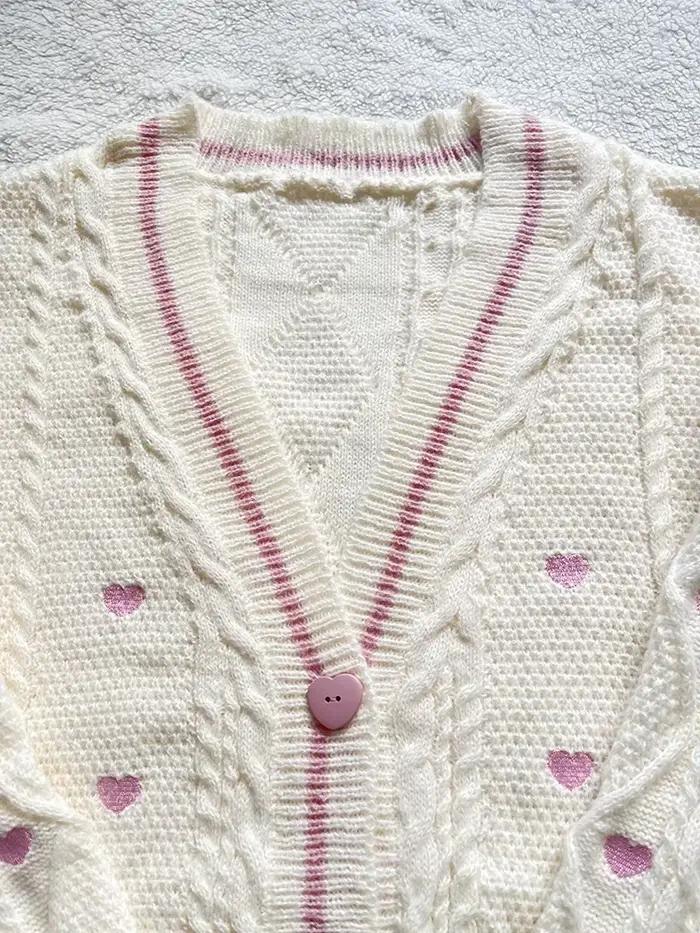 Cardigan d'amant avec bouton de coeur rose