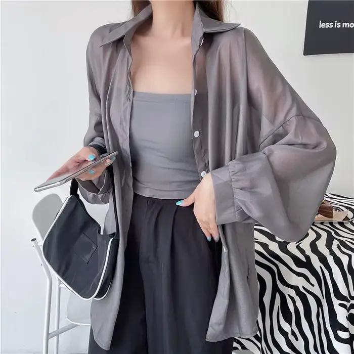 Chemisier en mousseline de soie transparente blanche pour femme