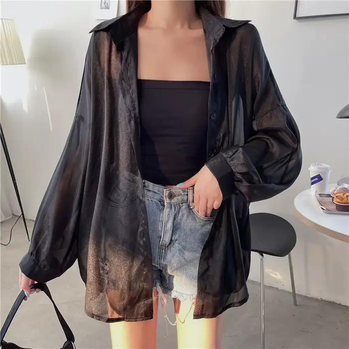 Chemisier en mousseline de soie transparente blanche pour femme