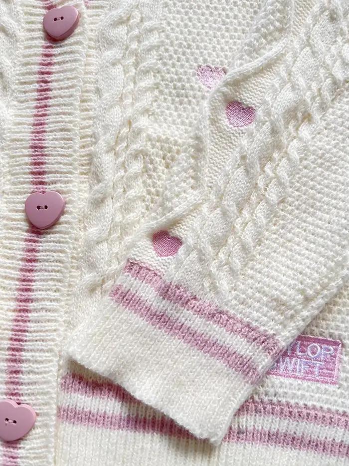 Cardigan d'amant avec bouton de coeur rose