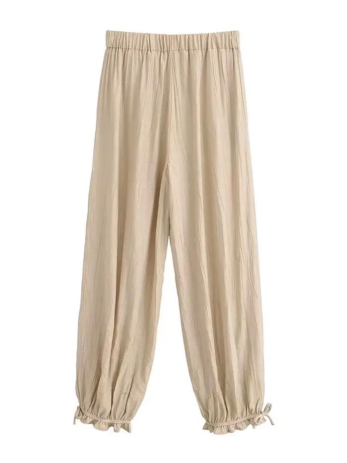Ensemble élégant pour femme : haut plissé perlé sans manches à col semi-montant et pantalon ample coupe lanterne – Collection été 2026 – Tenue décontractée pour le bureau