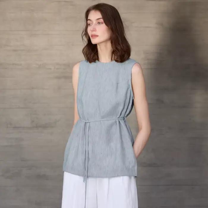 Haut en lin mi-long col rond débardeur femme style american retro sans manches amples pour les journées chaudes et les soirées chic