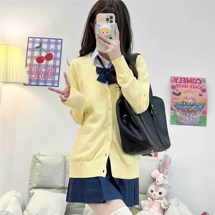 Cardigan en tricot jaune à manches longues et col en V pour femme