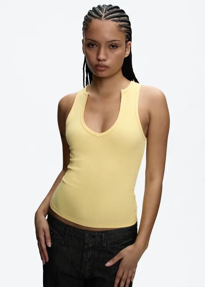 Débardeur côtelé pour femme junior avec col en V et bordure brute polyvalent en plusieurs couleurs et tailles