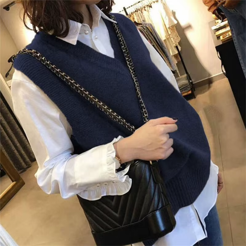 Gilet pull sans manches pour femme, couleur unie, coupe ample, col en V, gilet tricoté, idéal pour l'automne et l'hiver, vêtement de base décontracté, gilet en tricot.