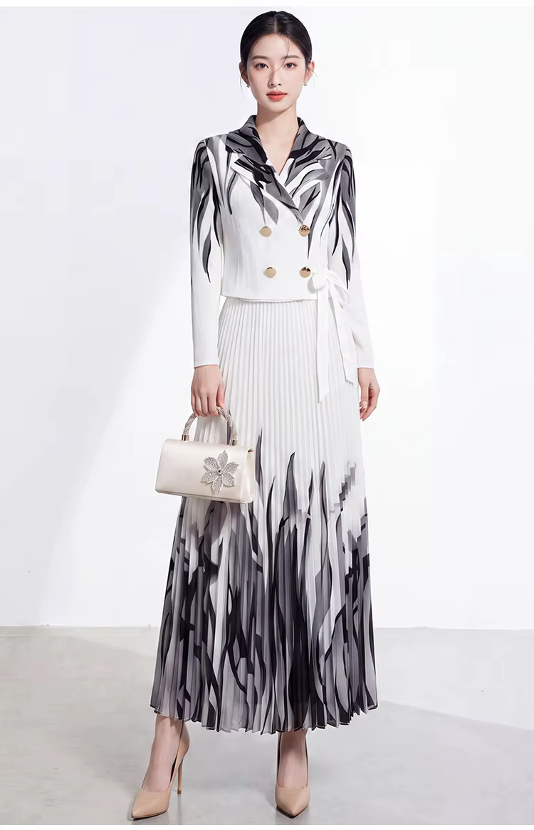 Vêtements pour femmes printemps/automne 2026, robe midi élégante Miyake avec jupe ample, col tailleur, taille cintrée, ceinture à nouer, motif imprimé.